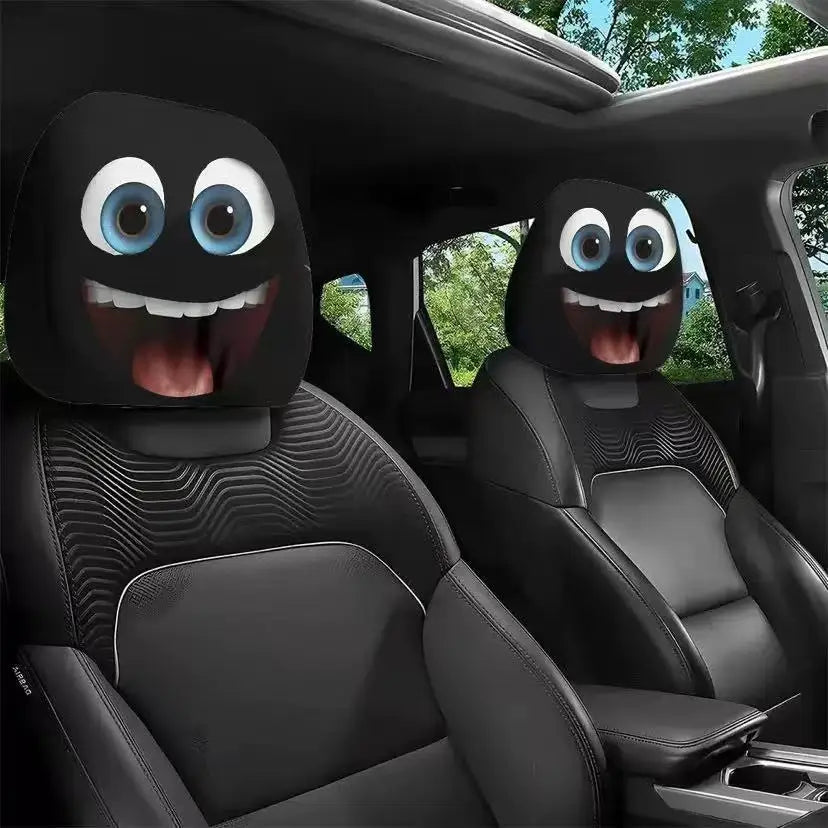 Car seat covers with cartoonish faces in a car interior