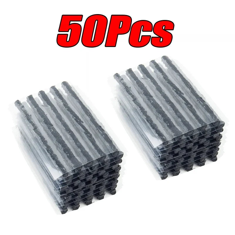 Two stacks of black tire repair plugs with '50Pcs' text in red above on a white background