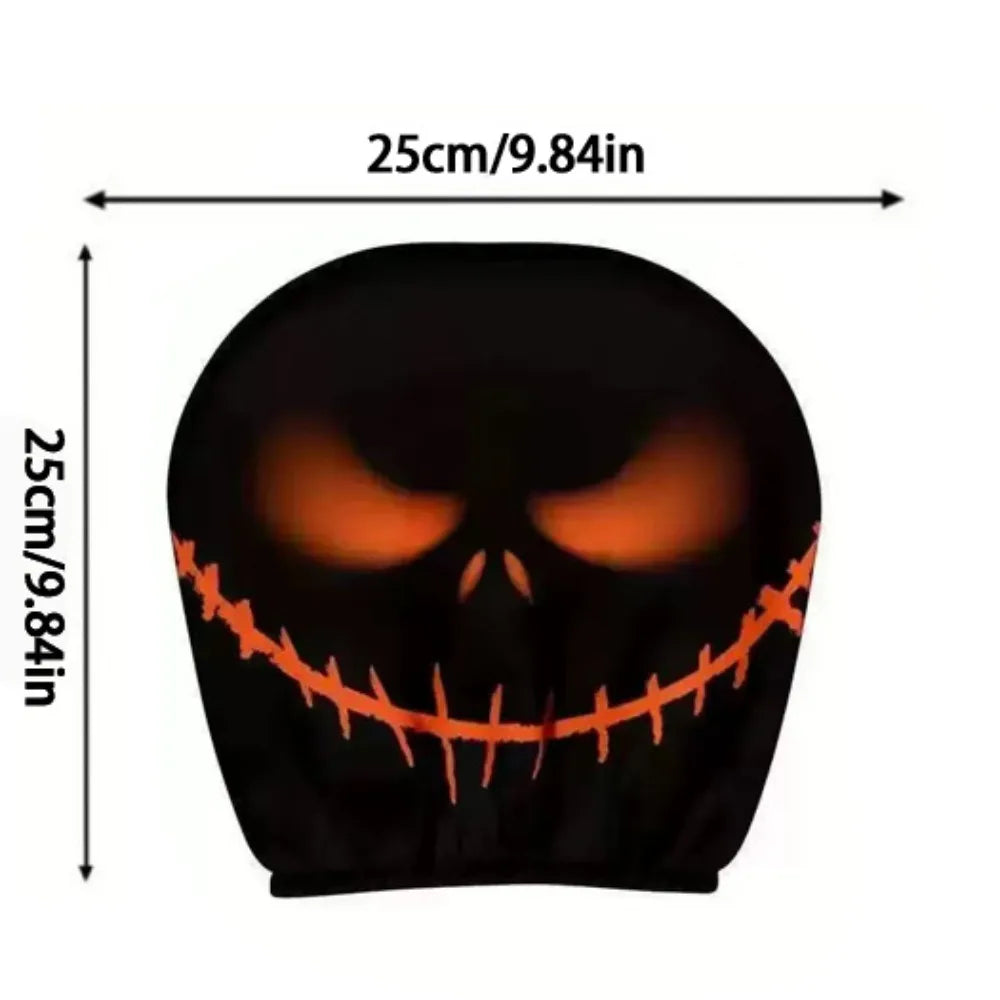 Black headrest cover with orange skull design and measurements